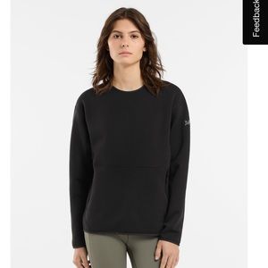 Arc’teryx Kynalite pullover. Super cozy fleece lined inside. Two front pockets.